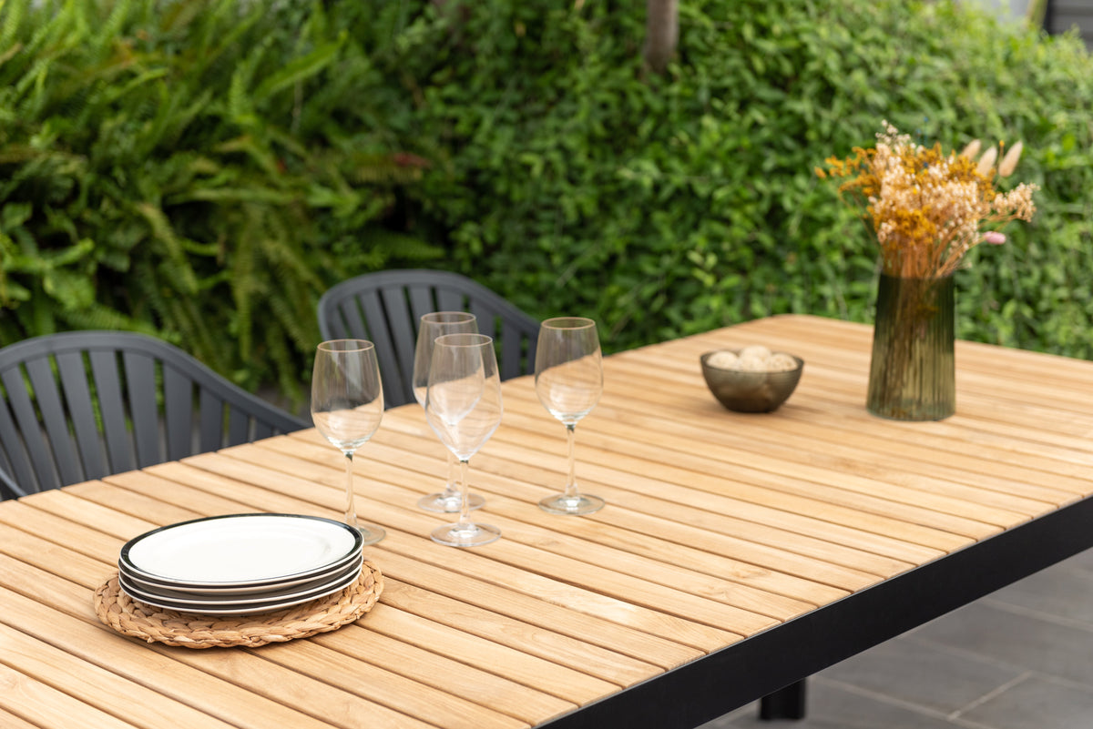Portals Dark Dining Set | 7-Piece | FSC Teak Table & 6 Nassau Black Aluminum Social Plastic® Chairs | LifestyleGarden